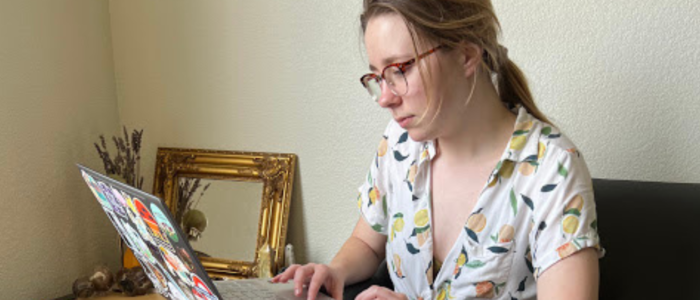 CEO Beth Bruch working on her computer